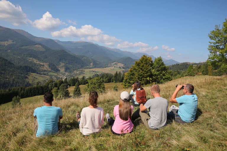 Group of people spending time together in mountains